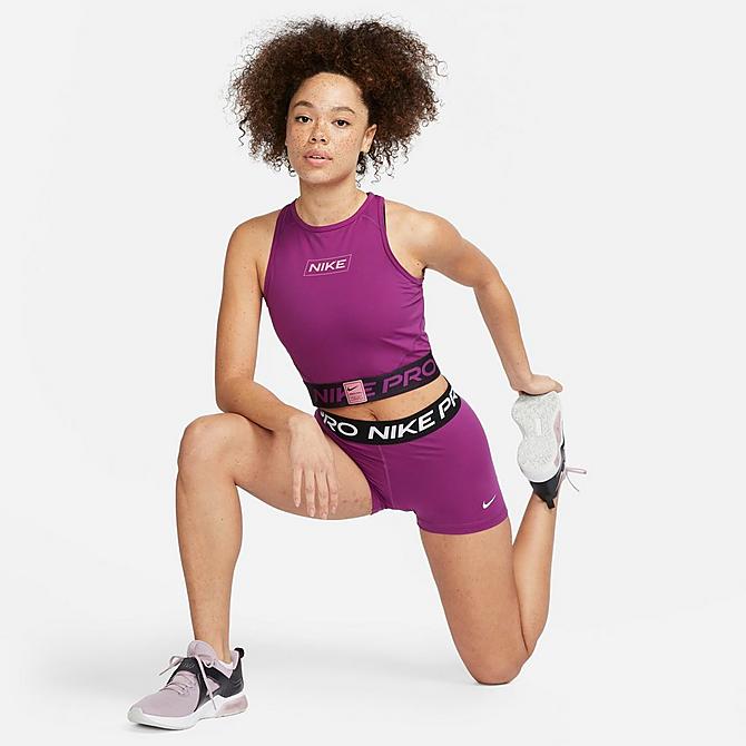 Front Three Quarter view of Women's Nike Pro Dri-FIT Graphic Crop Tank in Viotech/Cave Purple/Desert Berry Click to zoom