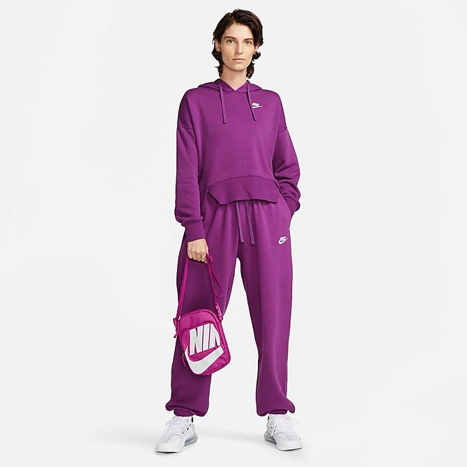 Front Three Quarter view of Women's Nike Sportswear Club Fleece Mid-Rise Oversized Sweatpants in Viotech/White Click to zoom