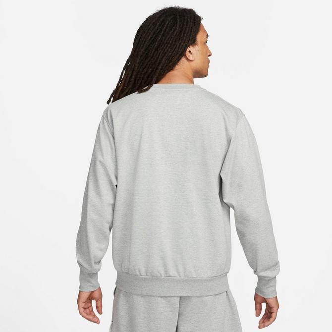[angle] view of Men's Nike Dri-FIT Standard Issue Crewneck Sweatshirt in Dark Grey Heather/Pale Ivory Click to zoom