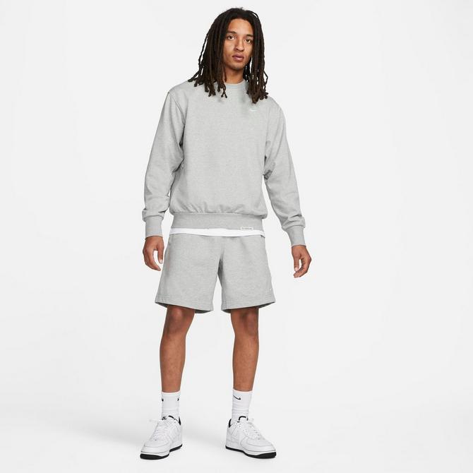 [angle] view of Men's Nike Dri-FIT Standard Issue Crewneck Sweatshirt in Dark Grey Heather/Pale Ivory Click to zoom