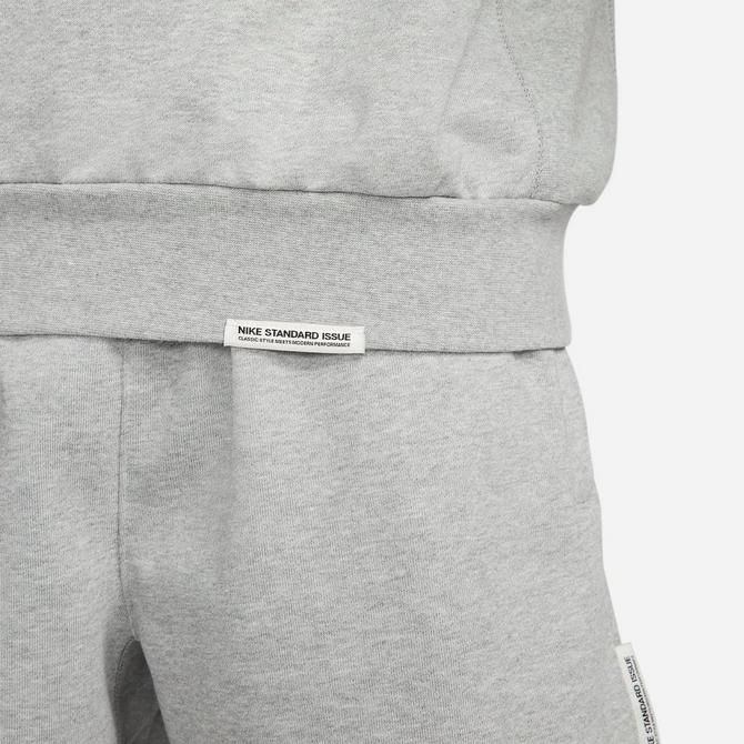 [angle] view of Men's Nike Dri-FIT Standard Issue Crewneck Sweatshirt in Dark Grey Heather/Pale Ivory Click to zoom