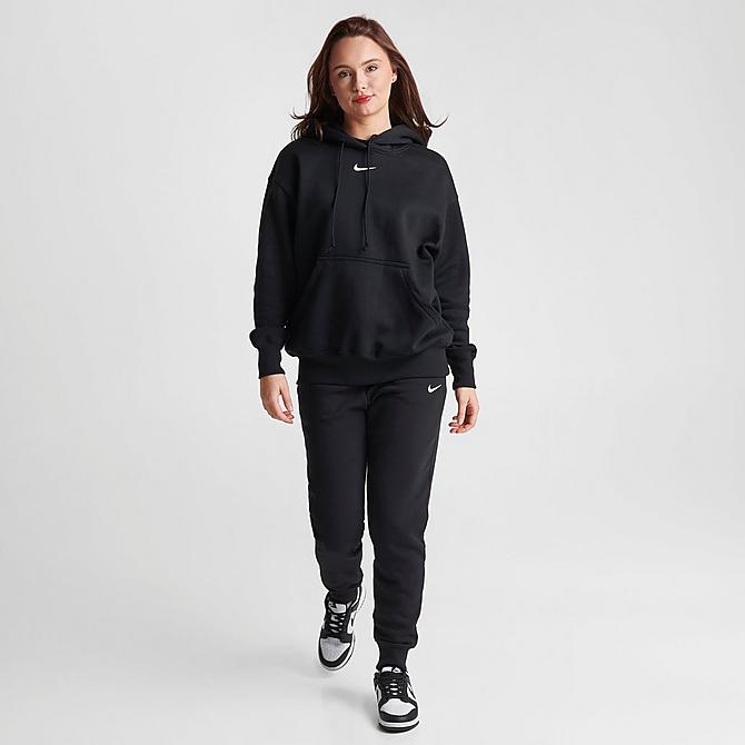 Front Three Quarter view of Women's Nike Sportswear Phoenix Fleece Oversized Pullover Hoodie in Black/Sail Click to zoom