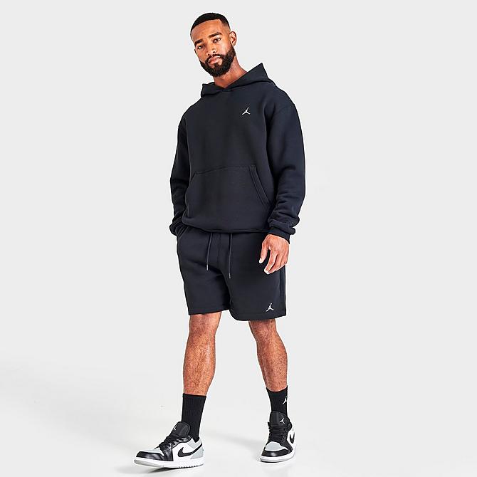 Front Three Quarter view of Men's Jordan Essential Jumpman Fleece Shorts in Black/White Click to zoom