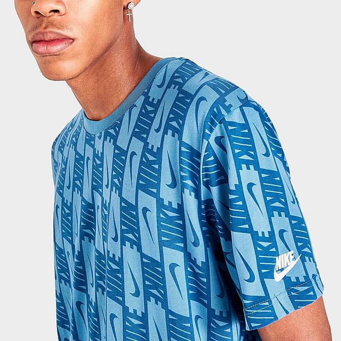 On Model 5 view of Men's Nike Sportswear Repeat Logo Graphic Print T-Shirt in Dutch Blue/Dark Marina Blue/White Click to zoom