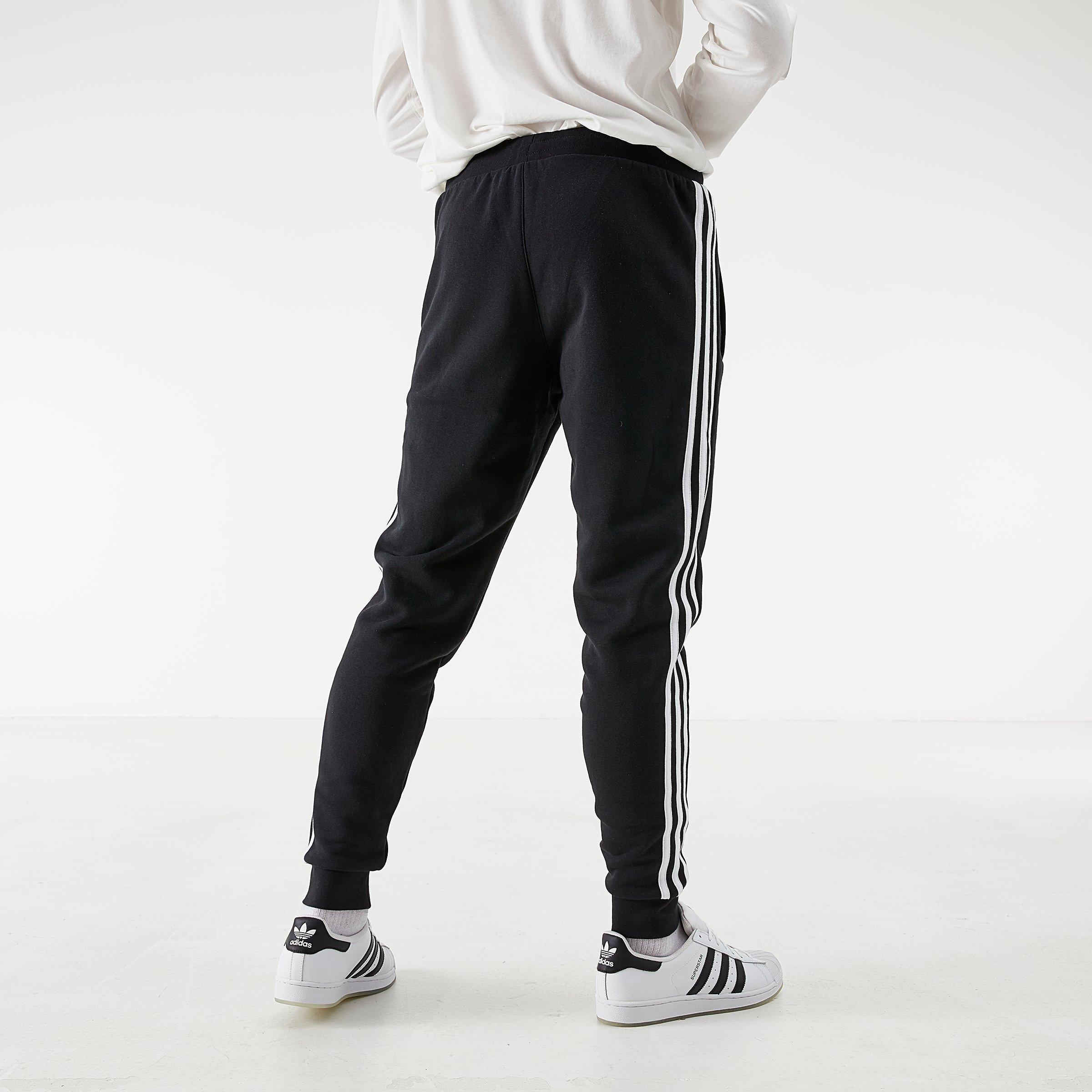 adidas pants with stripe on back