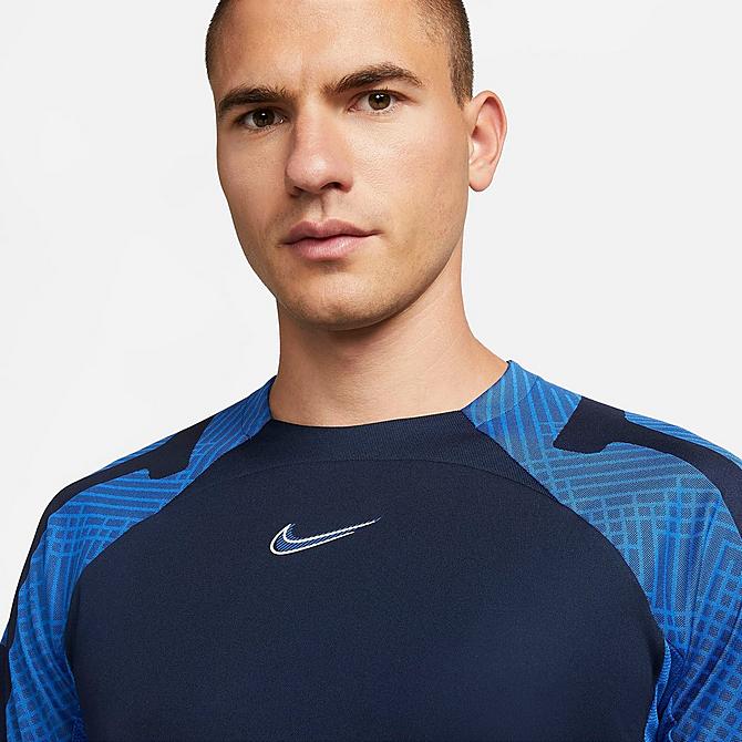 Back Right view of Men's Nike Dri-FIT Strike Soccer Top in Obsidian/Royal Blue/White Click to zoom