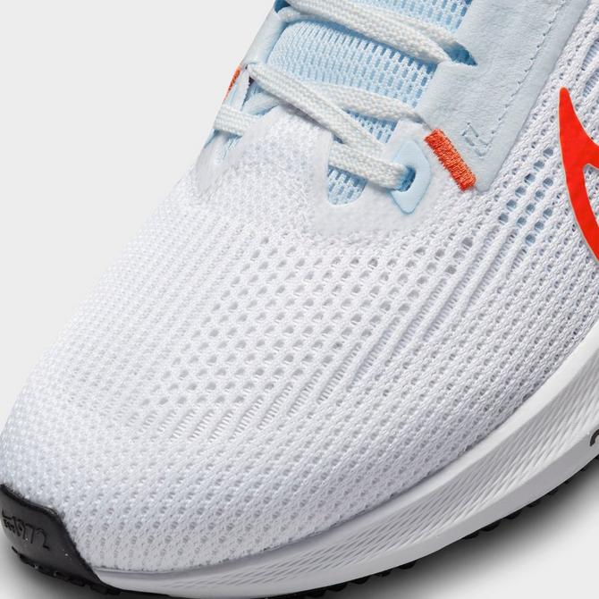 Light blue best sale nike running shoes