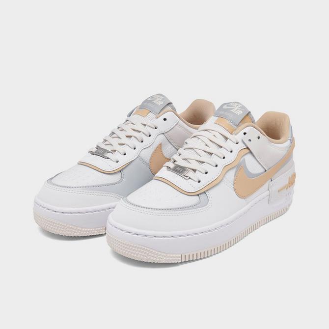 Nike Air Force 1 Shadow sneakers in white and gray