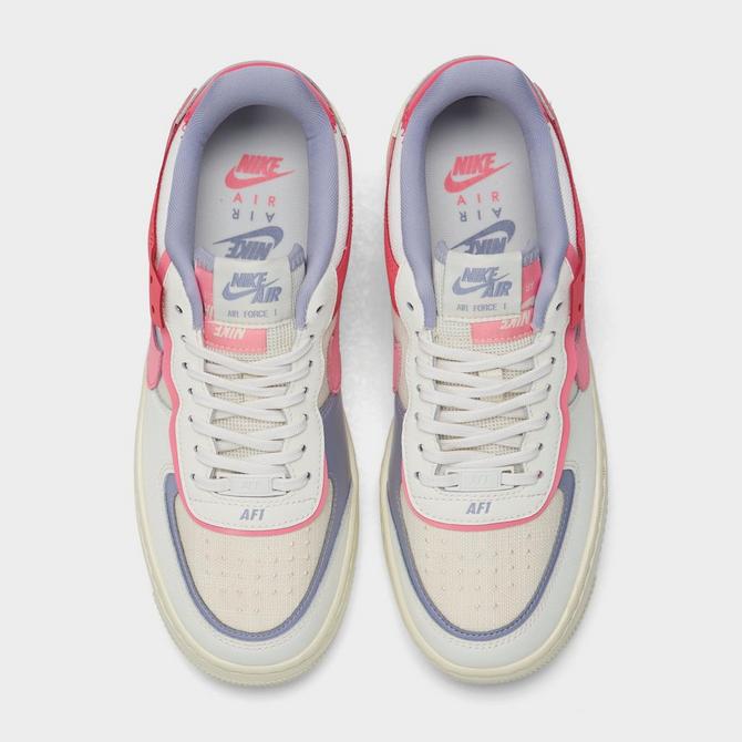 Nike Air Force 1 Shadow sneakers in white red and blue