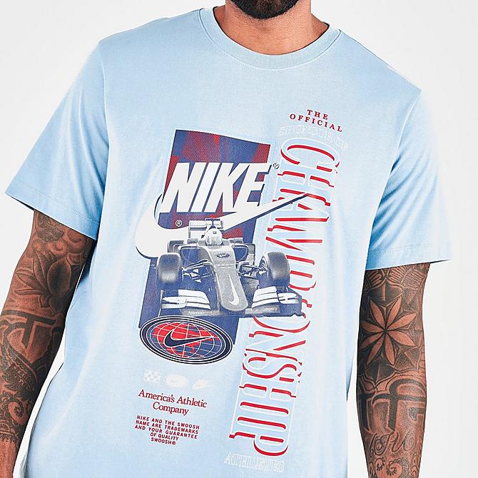 On Model 5 view of Men's Nike Sportswear Americana Graphic Short-Sleeve T-Shirt in Boarder Blue Click to zoom