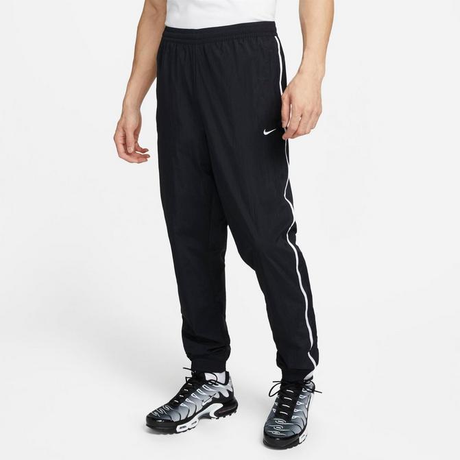 Nike - Tapered Logo-Print Nylon Track Pants - Men - White Nike