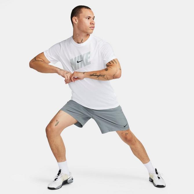 [angle] view of Men's Nike Form Dri-FIT Unlined 7" Versatile Shorts in Smoke Grey/Black Click to zoom
