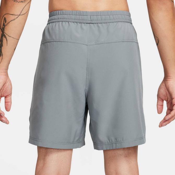 [angle] view of Men's Nike Form Dri-FIT Unlined 7" Versatile Shorts in Smoke Grey/Black Click to zoom