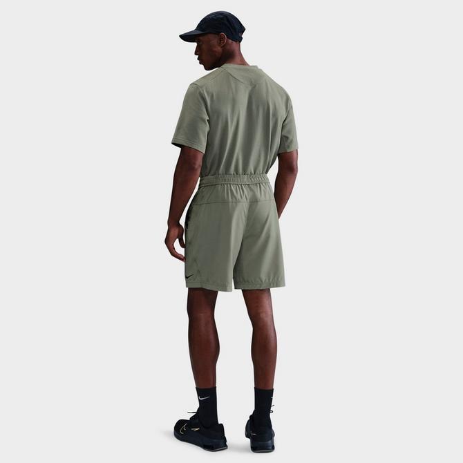 [angle] view of Men's Nike Form Dri-FIT Unlined 7" Versatile Shorts in Light Army/Black Click to zoom