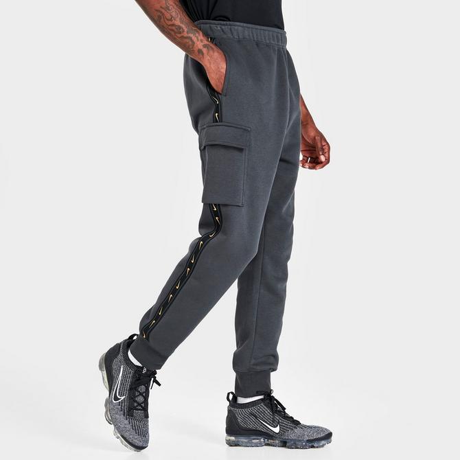 nike repeat logo taping cargo joggers in black
