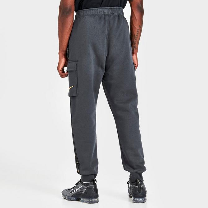 nike repeat logo taping cargo joggers in black