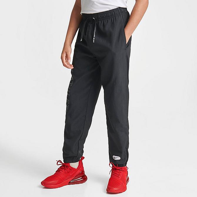 Back Left view of Kids' Nike Repel Athletics Training Jogger Pants in Black/Black/White/White Click to zoom