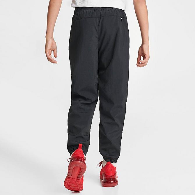 Back Right view of Kids' Nike Repel Athletics Training Jogger Pants in Black/Black/White/White Click to zoom