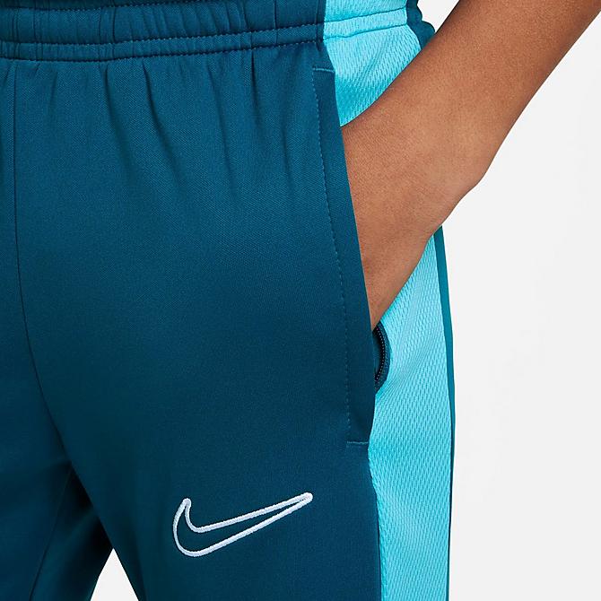 On Model 5 view of Kids' Nike Dri-FIT Academy23 Soccer Pants in Green Abyss/Baltic Blue/Green Abyss/White Click to zoom
