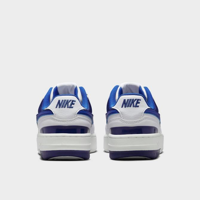 Nike Gamma Force trainers in white and game royal blue