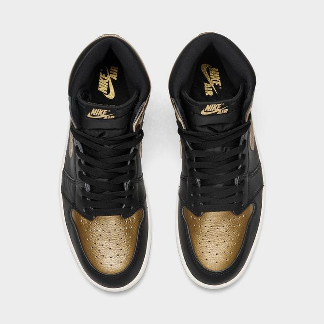 Black and gold jordans finish line best sale