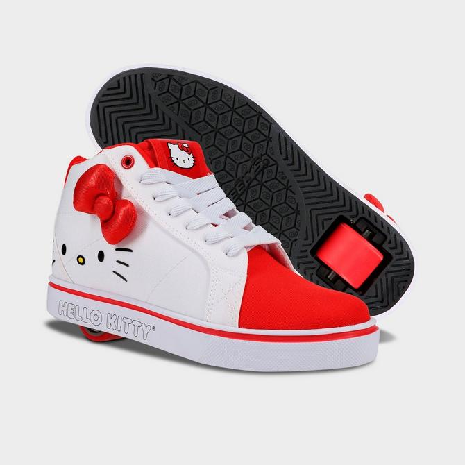 Three Quarter view of Girls' Little Kids' Heelys x Hello Kitty Racer Mid Casual Shoes in White/Red Click to zoom