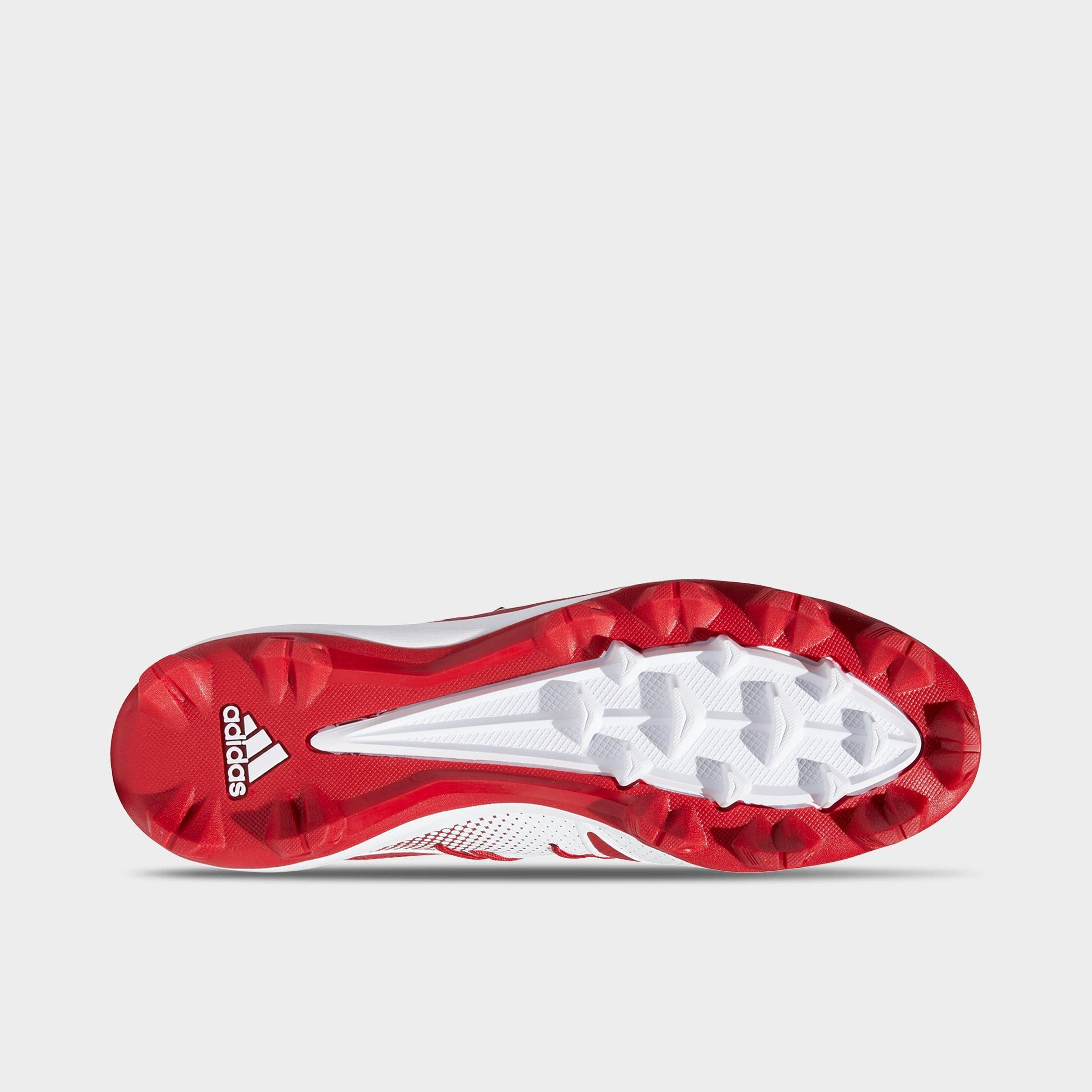 red molded baseball cleats