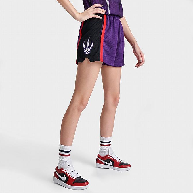 Front view of Women's Mitchell & Ness Toronto Raptors NBA Swingman Shorts in Purple Click to zoom