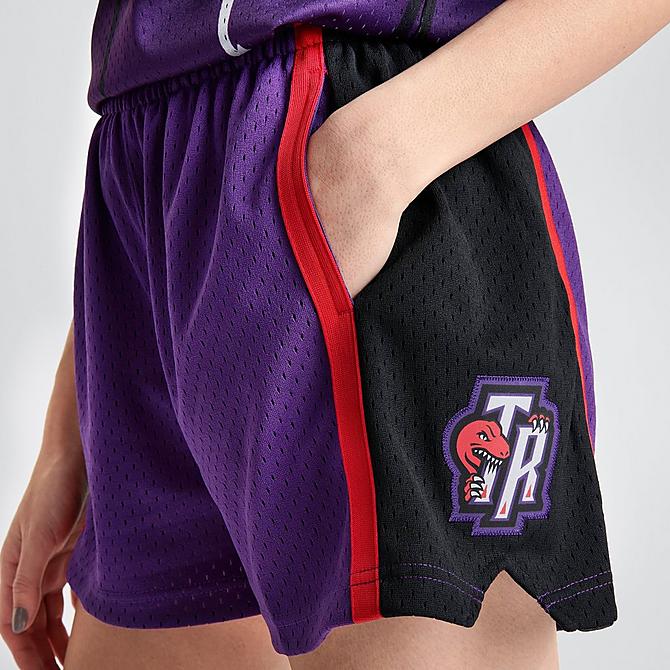 On Model 5 view of Women's Mitchell & Ness Toronto Raptors NBA Swingman Shorts in Purple Click to zoom
