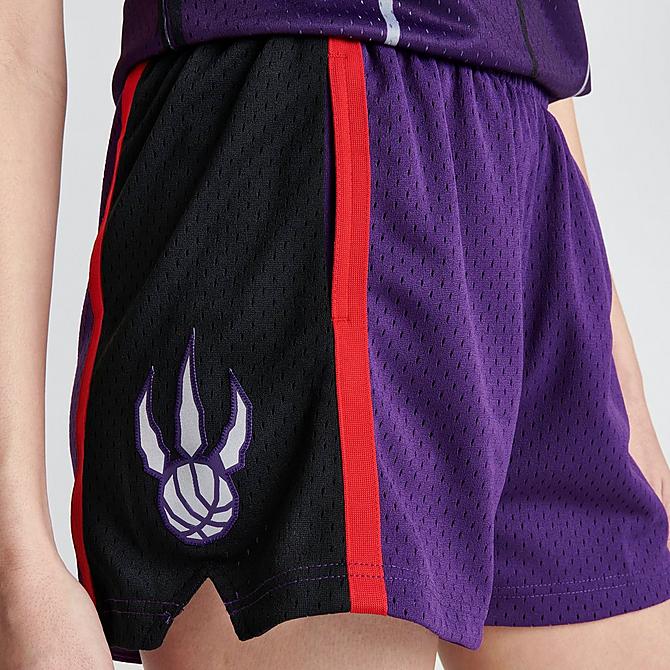 On Model 6 view of Women's Mitchell & Ness Toronto Raptors NBA Swingman Shorts in Purple Click to zoom