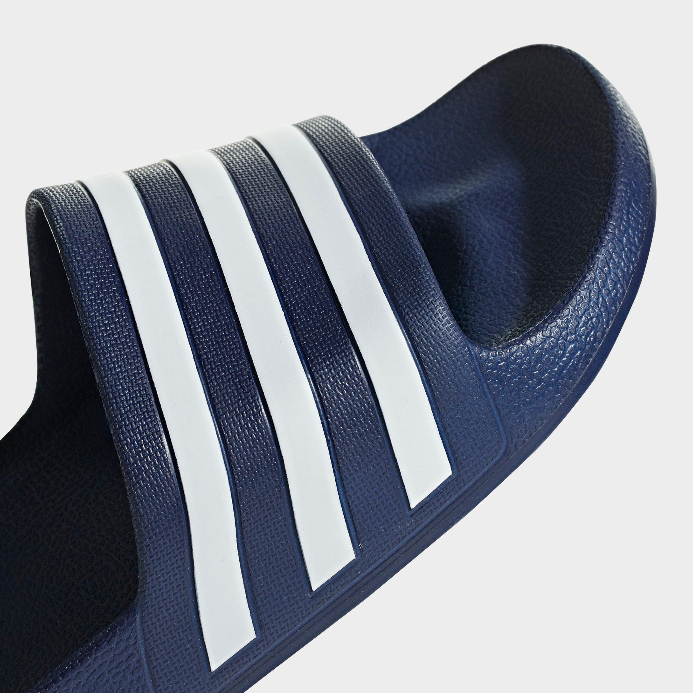 dark blue adidas slides