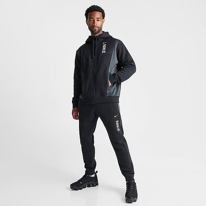 Front Three Quarter view of Men's Nike Sportswear Hybrid Fleece Full-Zip Hoodie in Black/Dark Smoke Grey Click to zoom