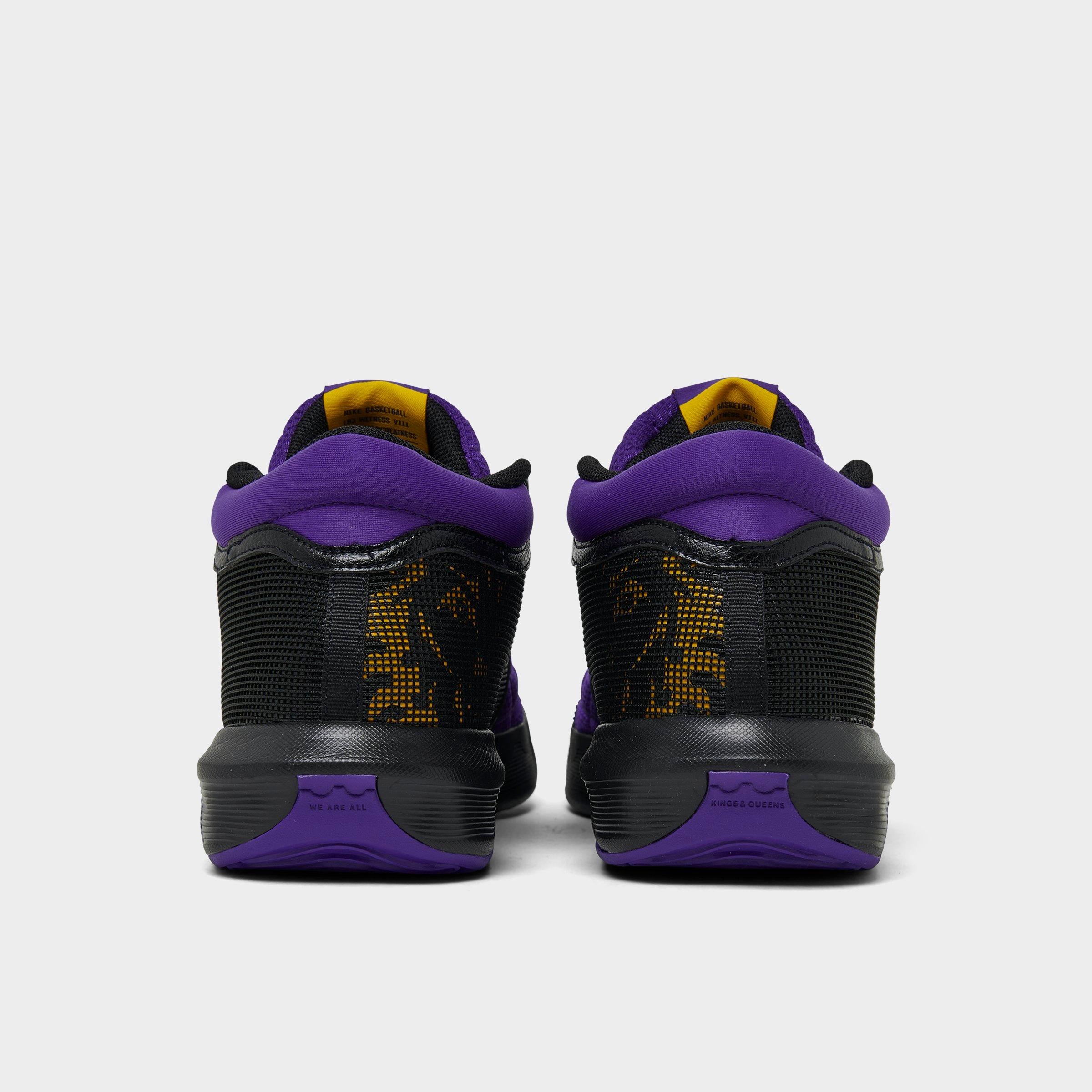 Purple and gold adidas basketball shoes