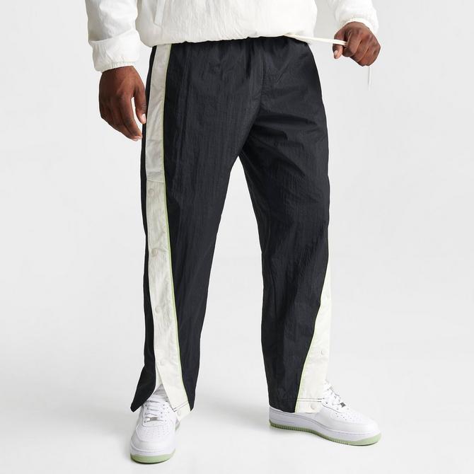 Men's Nike Dri-Fit basketball warm up pants. Size: L. Color: White and  Black.