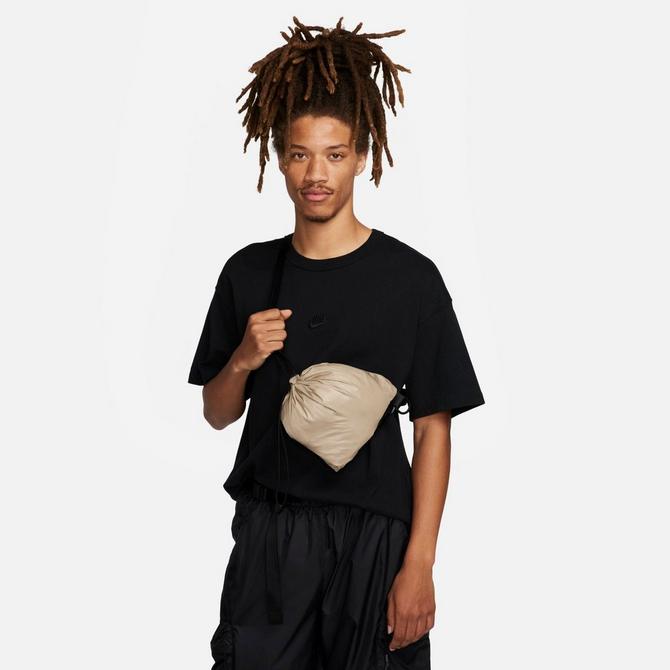 On Model 5 view of Men's Nike Sportswear Tech Woven N24 Packable Lined Jacket in Khaki/Black Click to zoom