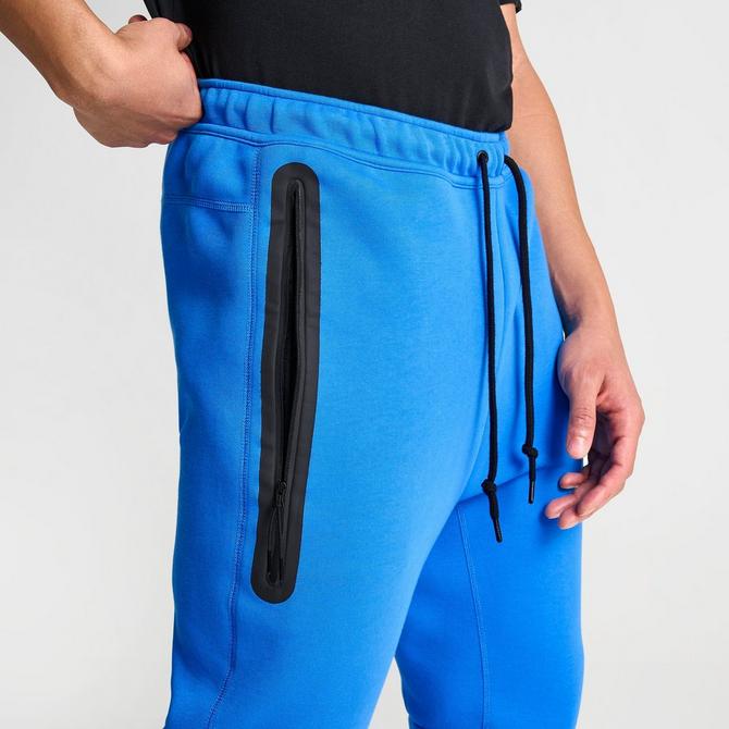 Blue nike tech on sale joggers