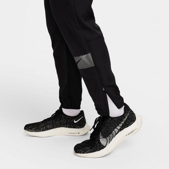 [angle] view of Men's Nike Challenger Flash Dri-FIT Woven Running Pants in Black Click to zoom