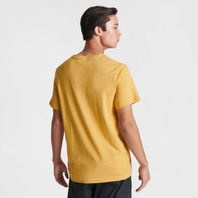 mustard yellow nike shirt