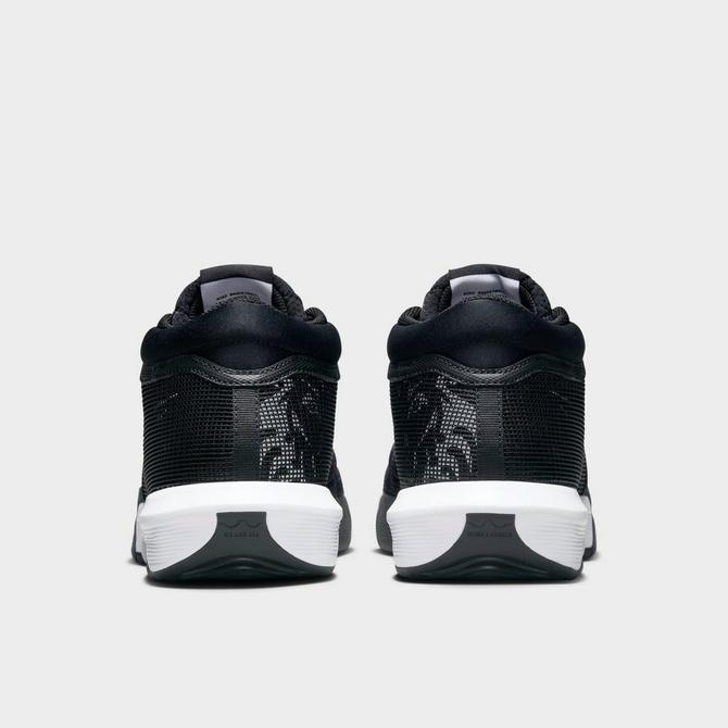 Left view of Nike LeBron Witness 8 TB Basketball Shoes in Black/White/Black Click to zoom
