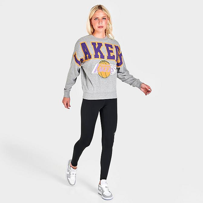 Front Three Quarter view of Women's Mitchell & Ness Los Angeles Lakers Logo Fleece Crewneck Sweatshirt in Grey Heather Click to zoom