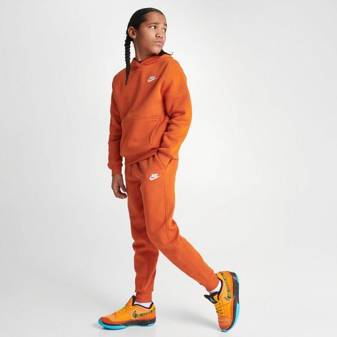 Orange nike best sale tech pants