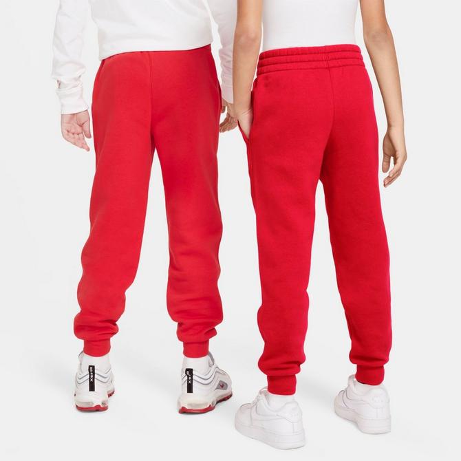 [angle] view of Kids' Nike Sportswear Club Fleece Jogger Pants in University Red/White Click to zoom