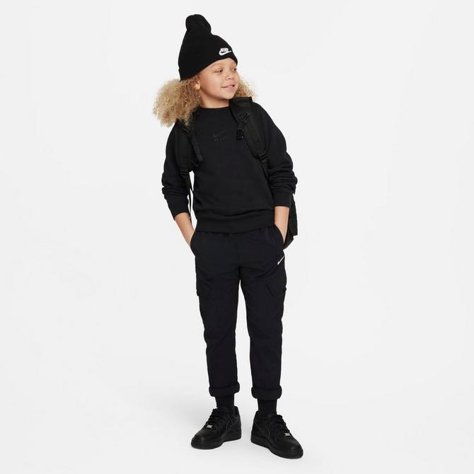 [angle] view of Kids' Nike Outdoor Play Woven Cargo Pants in Black Click to zoom