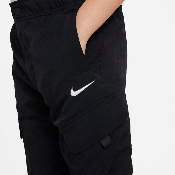 [angle] view of Kids' Nike Outdoor Play Woven Cargo Pants in Black Click to zoom