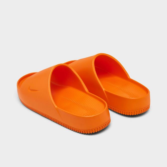 Orange nike best sale slides men's