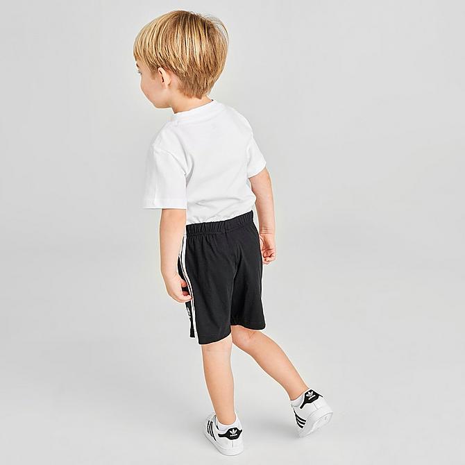 Front Three Quarter view of Kids' Infant and Toddler adidas Original Trefoil T-Shirt and Shorts Set in White/Black Click to zoom