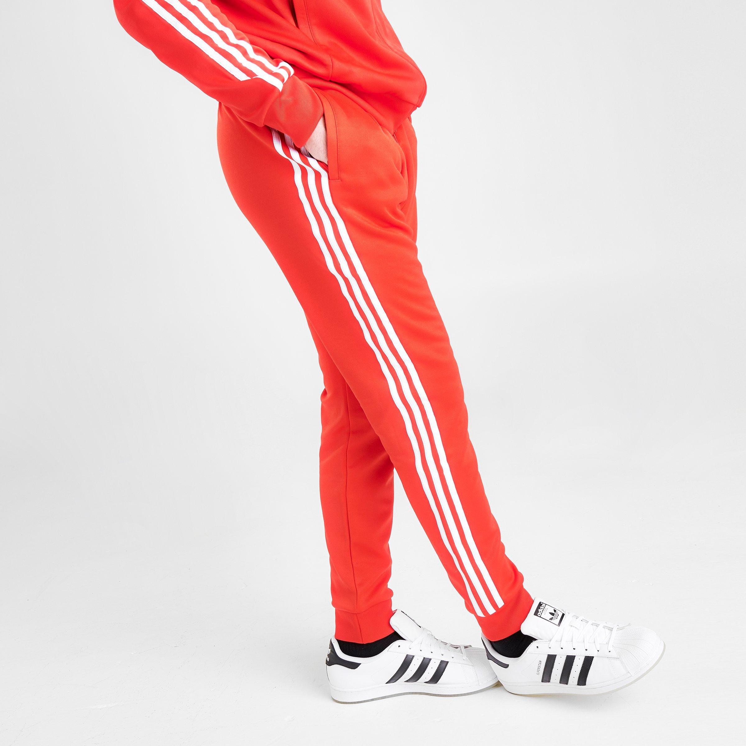 adidas sst track pants mens red