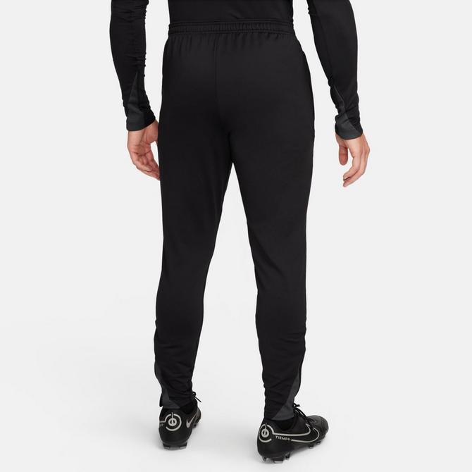 [angle] view of Men's Nike Strike Dri-FIT Soccer Pants in Black/Black/Anthracite/White Click to zoom
