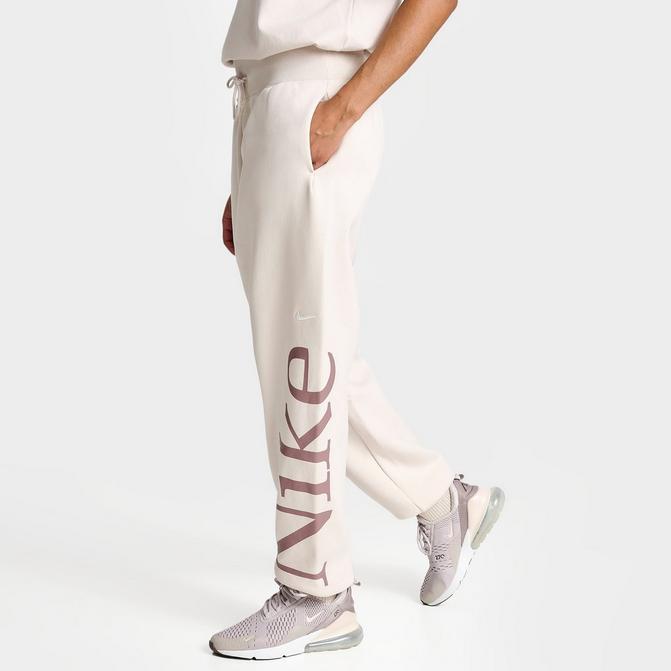 Nike mini swoosh high rise wide leg joggers in sail white