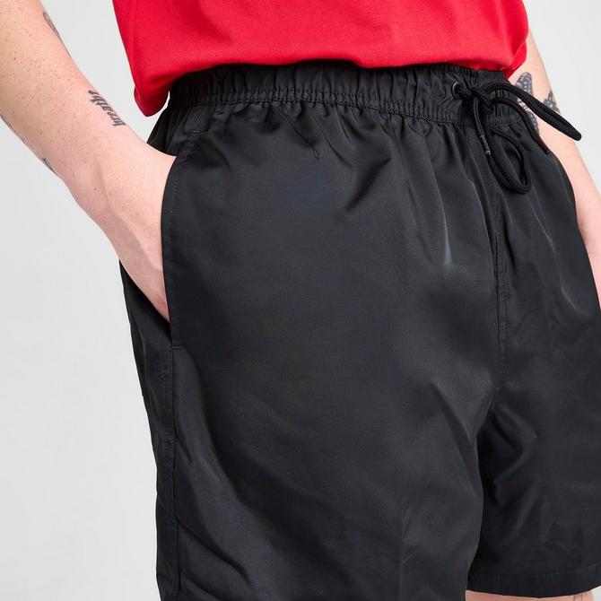[angle] view of Men's Nike Club Woven 6" Flow Shorts in Black/White Click to zoom